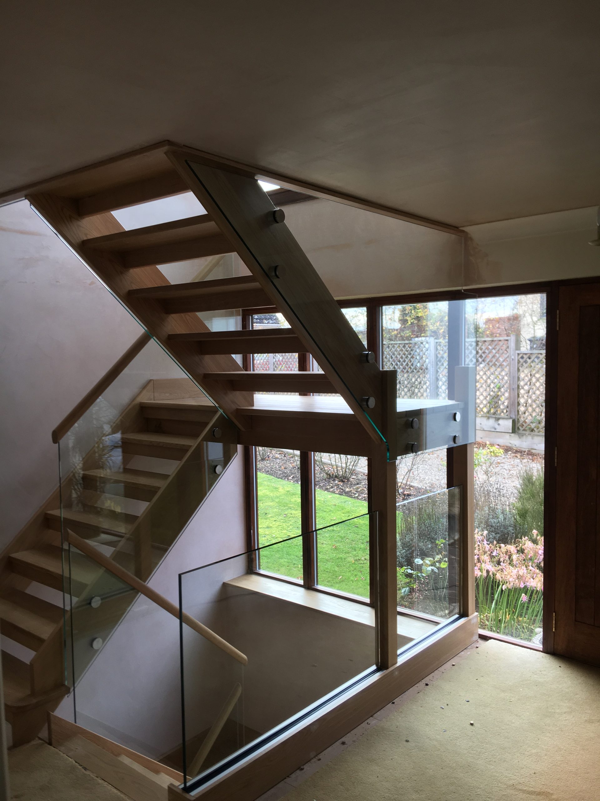 New Staircase With Glass Bannisters